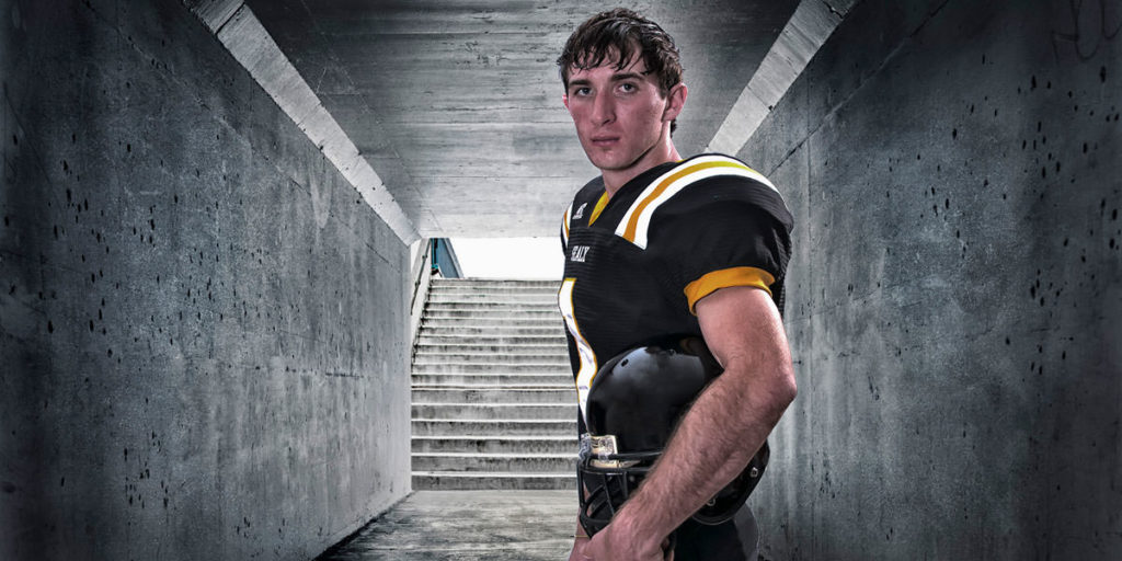 Football artistic senior portraits made near Houston by Sandy Flint | Flint Photography