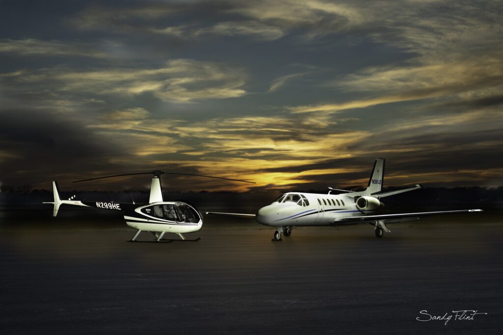 Airplane and Helicopter photographed at night by Sandy Flint